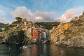 Stunning view of colorful Riomaggiore village at sunset in Cinque Terre, Italy Royalty Free Stock Photo