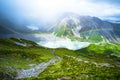 Stunning view on the high mountain after the rain with colorful rainbow over the rocky mountain and glacier in Mt Cook National Royalty Free Stock Photo