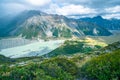 Stunning view on the high mountain after the rain with colorful rainbow over the rocky mountain and glacier in Mt Cook National Royalty Free Stock Photo