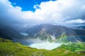 Stunning view on the high mountain after the rain with colorful rainbow over the rocky mountain and glacier in Mt Cook National Royalty Free Stock Photo