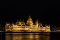 Stunning view of the Hungarian Parliament Building at the bank of River Danube at night in Budapest Royalty Free Stock Photo