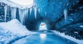 Magical Ice Cave Landscape with Icicles and Frozen Water Stream Royalty Free Stock Photo