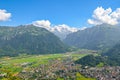 Stunning view of Interlaken and adjacent mountains photographed from the top of Harder Kulm in Switzerland. Swiss Alps landscape. Royalty Free Stock Photo