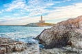 Stunning view on Lighthouse of Vieste, rising on the isle of Santa Eufemia Royalty Free Stock Photo