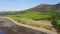 Stunning View Of Lush Fields And Rocky Yr Eifl Mountain At The Coast Of Llyn Peninsula In Wales, UK