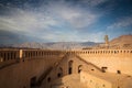 Stunning view of the Nizwa fort surrounded by mountains