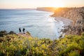 Stunning view over Praia do Camilo in Lagos, Algarve Portugal during the sunrise. Rocks, cliffs and formations in the ocean.