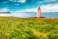 Stunning view of Skarsviti lighthouse in Vatnsnes peninsula on a clear day in North Iceland