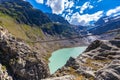 Stunning view of Trift bridge over the lake and glacier