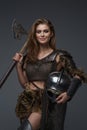 Stunning Viking model dressed in chainmail armor and fur