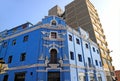 Stunning vivid blue and white vintage building in downtown Lima, Peru