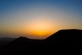 Stunning warm sunset over Calderon Hondo volcano near Corralejo in Fuerteventura Spain Royalty Free Stock Photo