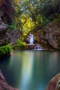 Stunning waterfall with an emerald pond in deep green forest in Manavgat, Antalya, Turkey Royalty Free Stock Photo