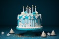 A stunning white birthday cake featuring teal ganache, star decorations