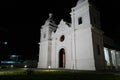 Stunning white church building illuminated at night in Quelimane, Mozambique