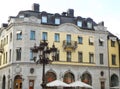 Stunning white and yellow vintage architecture with a gorgeous street lamp, Uppsala, Sweden