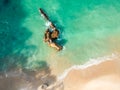 Stunning wide angle aerial drone view of a rock in the water at Otama Beach near Matarangi on the Coromandel Peninsula in New Zeal