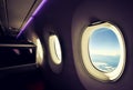 Stunning wide angle view of three airplane windows seen from a business class seat on a long haul widebody aircraft