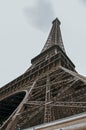 Stunning wide shot of the Eiffel Tower in detail with dramatic sky.