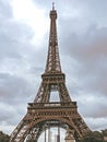 Stunning wide shot of the Eiffel Tower with dramatic sky.