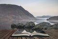 Stunning Winter foggy sunrise on Crummock Water in Lake District Royalty Free Stock Photo