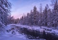 Greeting card with sunset winter Lapland landscape
