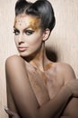 Stunning woman with luxury golden make-up Royalty Free Stock Photo