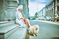 Stunning woman with little dog