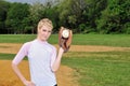 Stunning young blonde female softball player