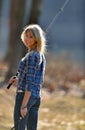 Stunning young blonde woman fishing Royalty Free Stock Photo