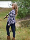 Stunning young woman fishing