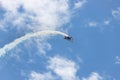 Stunt flying with smoke Royalty Free Stock Photo