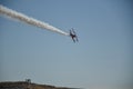 A stunt plane performance at an air show.