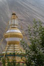 Stupa being decorated in Spiti valley. Tibetan culture of stupa