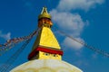 Stupa with Buddha eyes and Tibetan prayer flags in Nepal Royalty Free Stock Photo