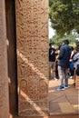 Stupa No 1, North Gateway, Left Pillar, Outside panel : Chain of palmettes in the middle of the pillar. Buddha-pada footprints of