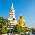 Stupa and statue of Buddha in Paknam Phasi Charoen in the streets of Bangkok - Thailand