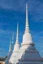 White stupas in Buddhist temple in Thailand