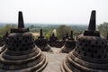 Stupas of Borobudur temple, Java, Indonesia overlooking the landscape