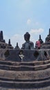 Stupas and Statue of Buddha at Borobudur Temple, Yogjakarta Indonesia.