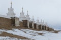 Stupas on the walls of Erdene Zuu Monastery in winter Royalty Free Stock Photo