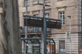 Building and Rosenstein S-Bahn station in front with schedule display in Stuttgart, Bad Connstatt