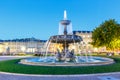 Stuttgart Castle square Schlossplatz Neues Schloss with fountain travel at twilight in Germany