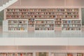Stuttgart, Germany - Aug 1, 2020 - Bookshelves at Stadtbibliothek public library with sun light in the morning