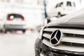 Stuttgart, Germany - December 12, 2017: Close-up Mercedes-Benz car grill at maintenance station. MB vehicle service repair worksho