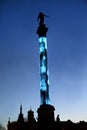 Column, statue of the Roman goddess Concordia. The Christmas market in Stuttgart, Germany.