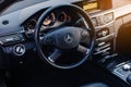 Stuttgart, Germany - January 23, 2020: Original Mercedes E-class W212 interior, avantgarde, Mercedes logo, dash board. Royalty Free Stock Photo