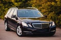 Stuttgart, Germany - January 28, 2020: Original Mercedes E-class W212 Touring Wagon, avantgarde, Mercedes logo, front light. Royalty Free Stock Photo