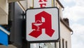 Close up of a German pharmacy sign.