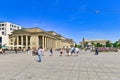 Stuttgart, Germany - Town square called `Schlossplatz` with old historic shopping center building and people